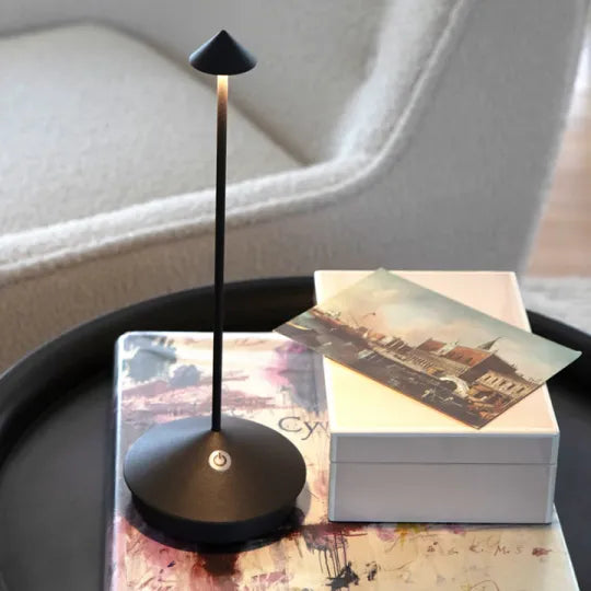 Wireless LED table lamp with a slim stem, conical shade and round base