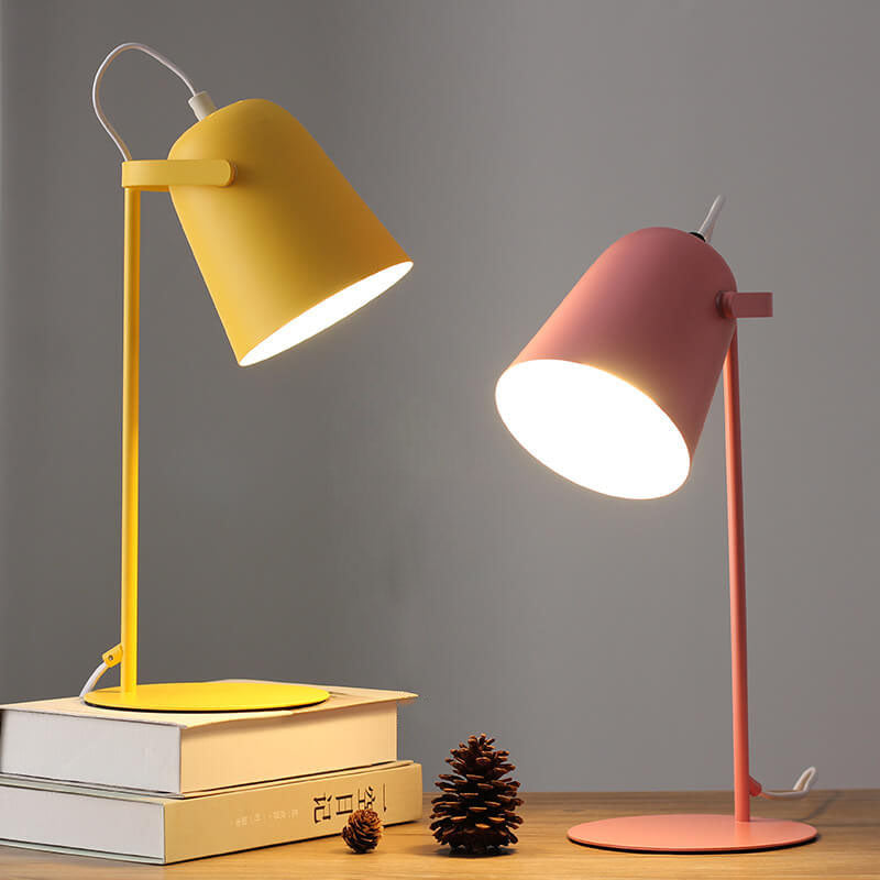 Nordic-style table lamp with angled metal shade, slim stand and round base
