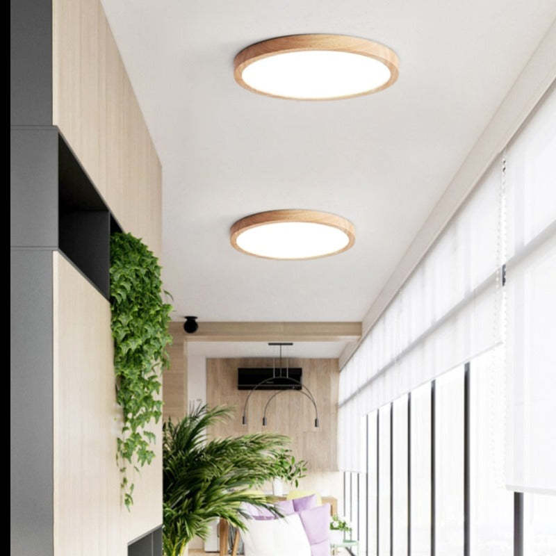 Round dimmable LED ceiling light with a light wood-effect surround