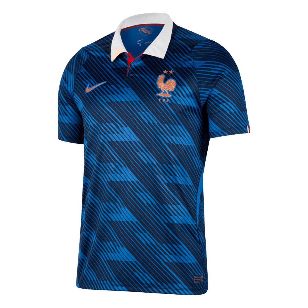 Blue short-sleeve football shirt with geometric pattern and white collar