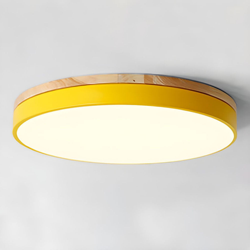 Round flush mount ceiling light with wood-effect rim and white diffuser