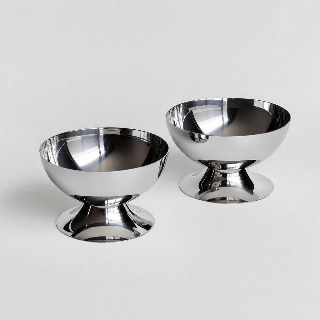 Silver stainless steel ice cream cup with a rounded bowl and pedestal base