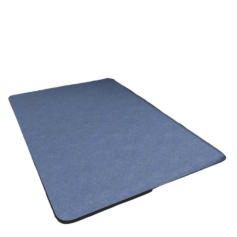 Rectangular bathroom mat with rounded corners and dark edging