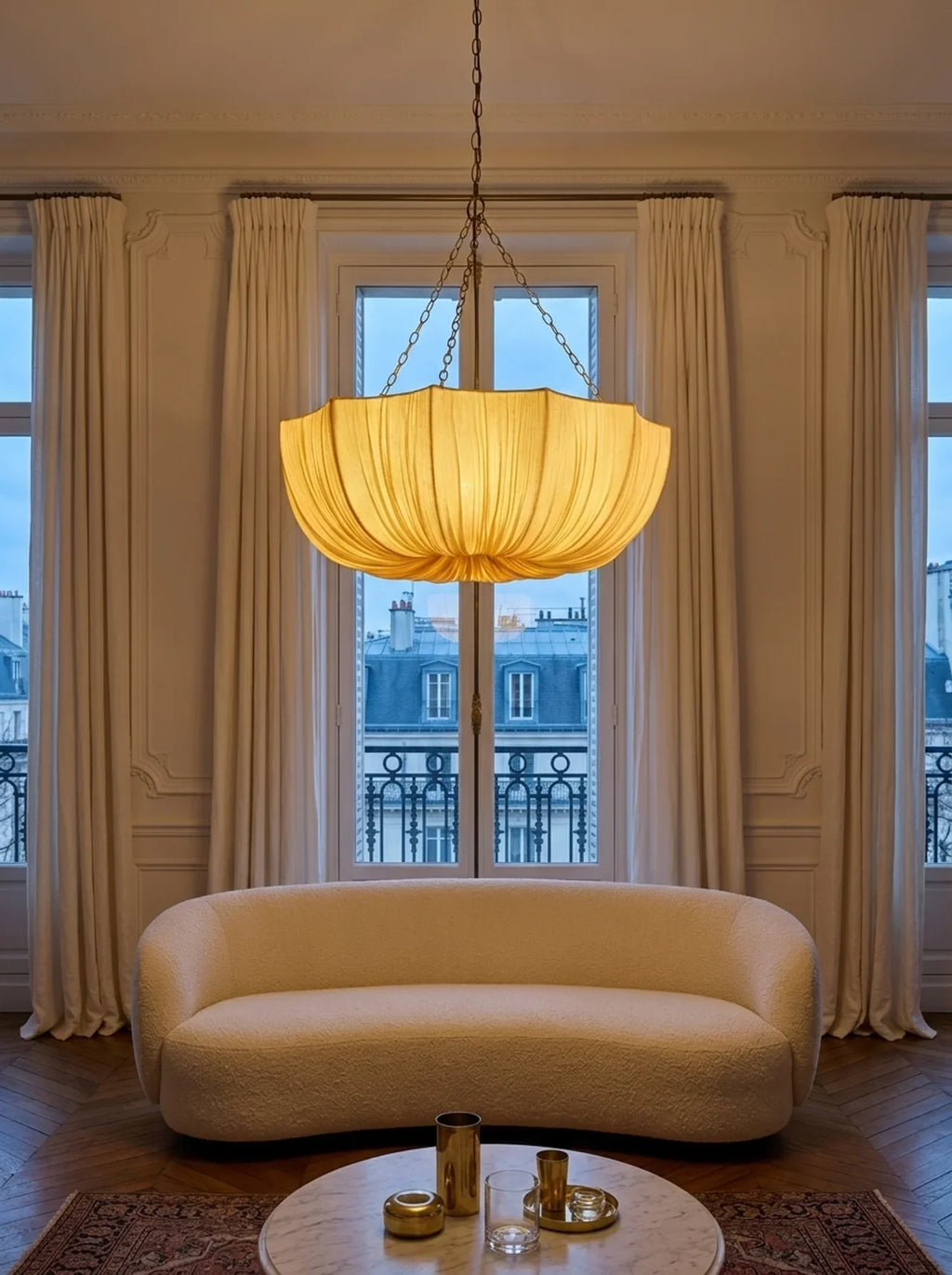 Cream pleated pendant light with dark chain suspension