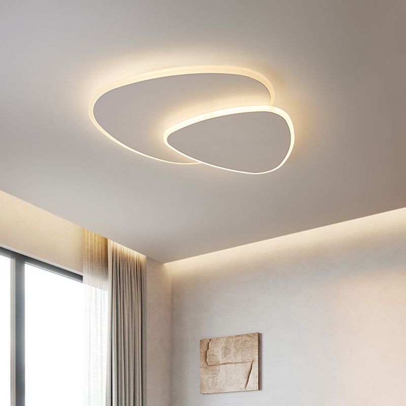 Modern white flush mount ceiling light with two overlapping rounded panels