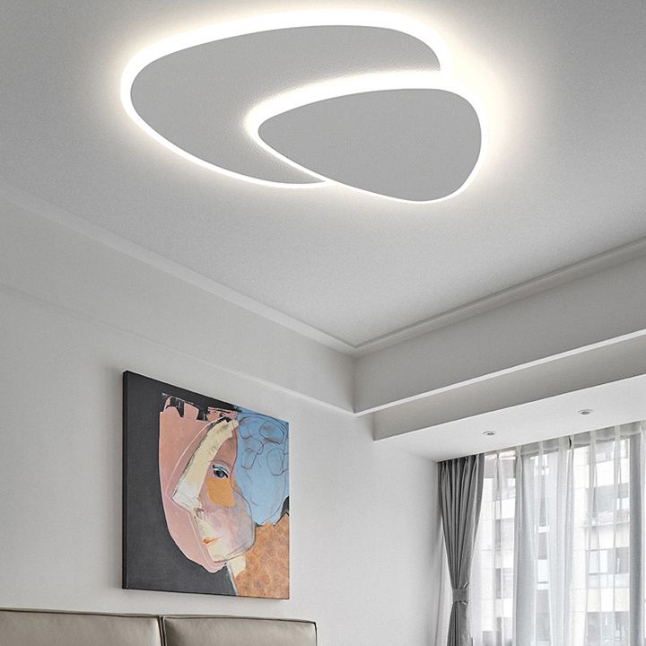 Modern white flush mount ceiling light with two overlapping rounded panels