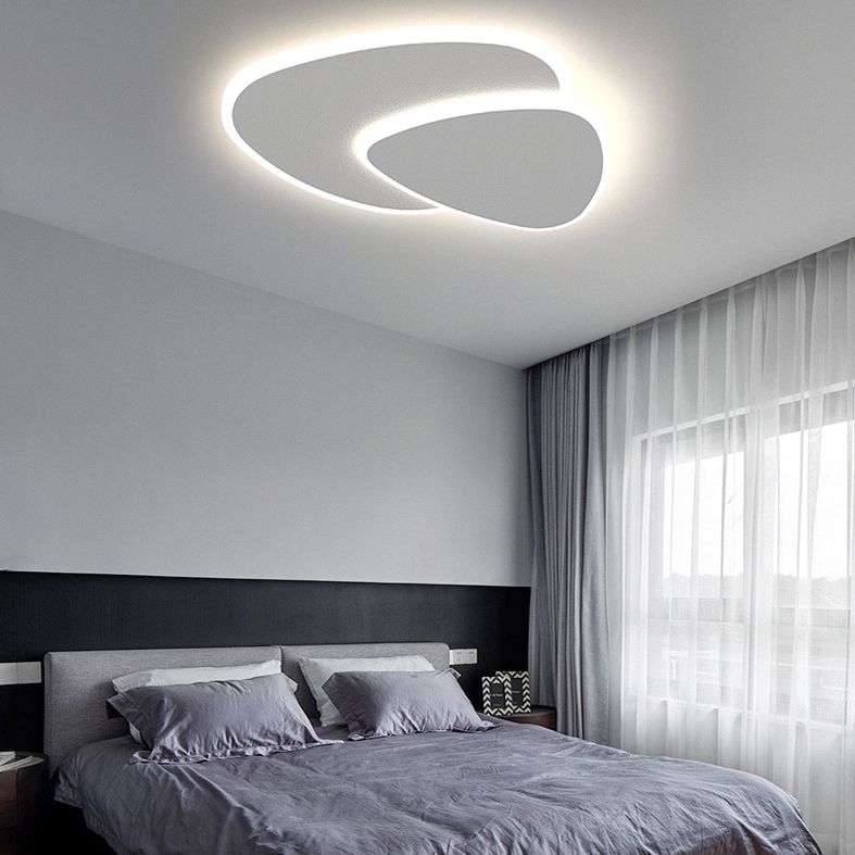 Modern white flush mount ceiling light with two overlapping rounded panels