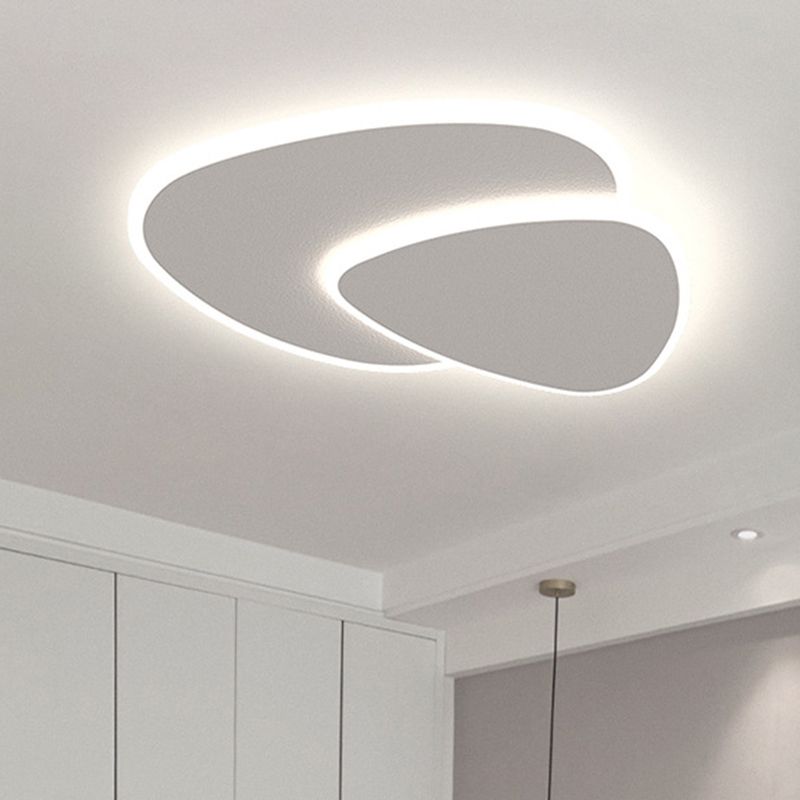 Modern white flush mount ceiling light with two overlapping rounded panels