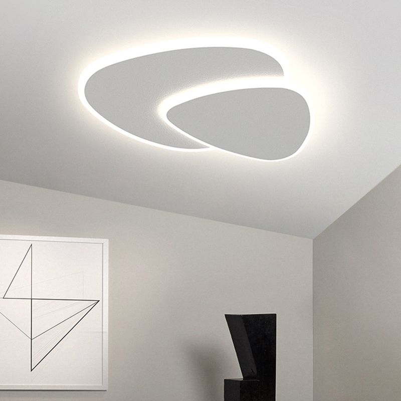 Modern white flush mount ceiling light with two overlapping rounded panels