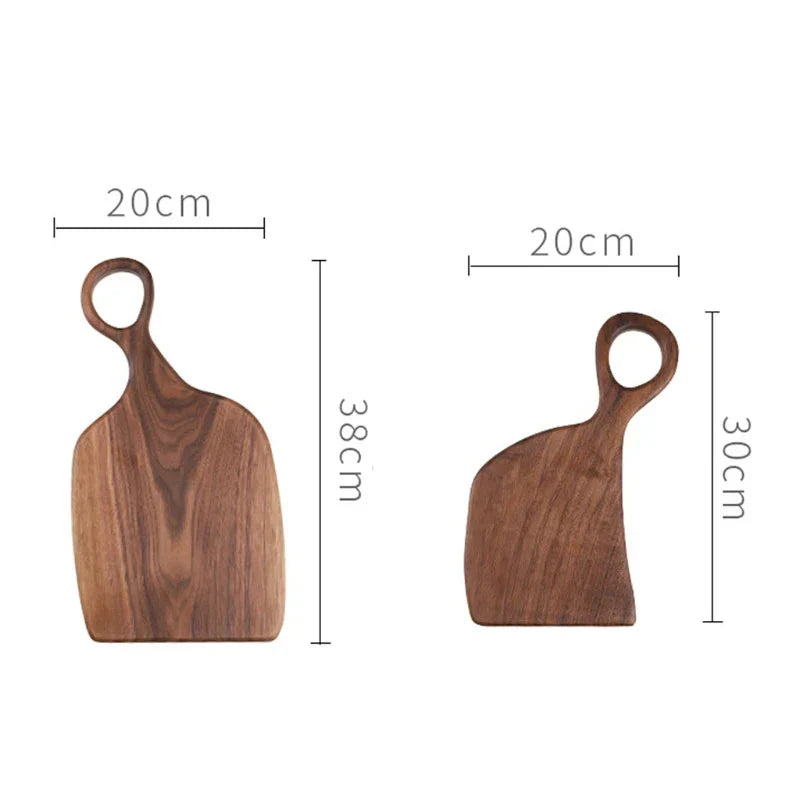 Brown walnut cutting board with shaped handle and rounded hanging hole