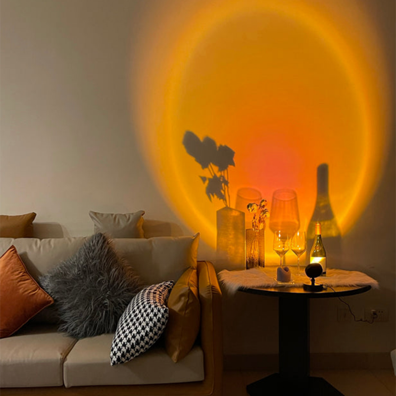 Circular glowing LED table lamp with dark stand and round base