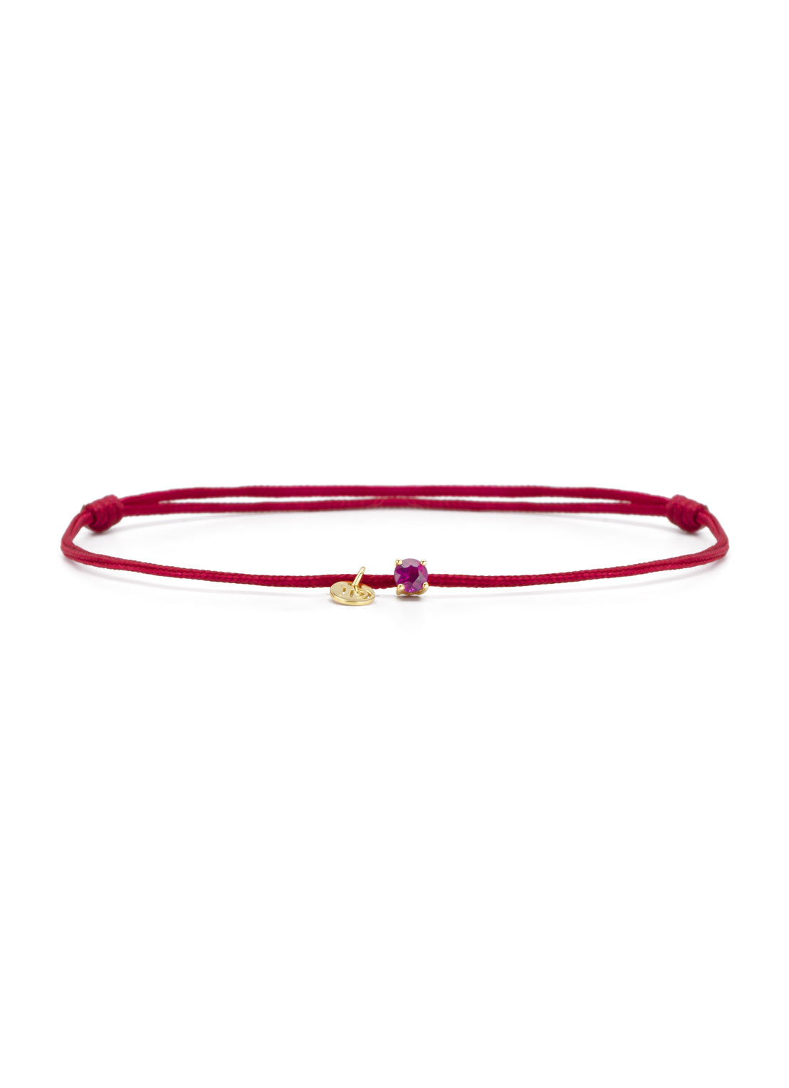 Red cord bracelet with ruby and yellow gold disc charm