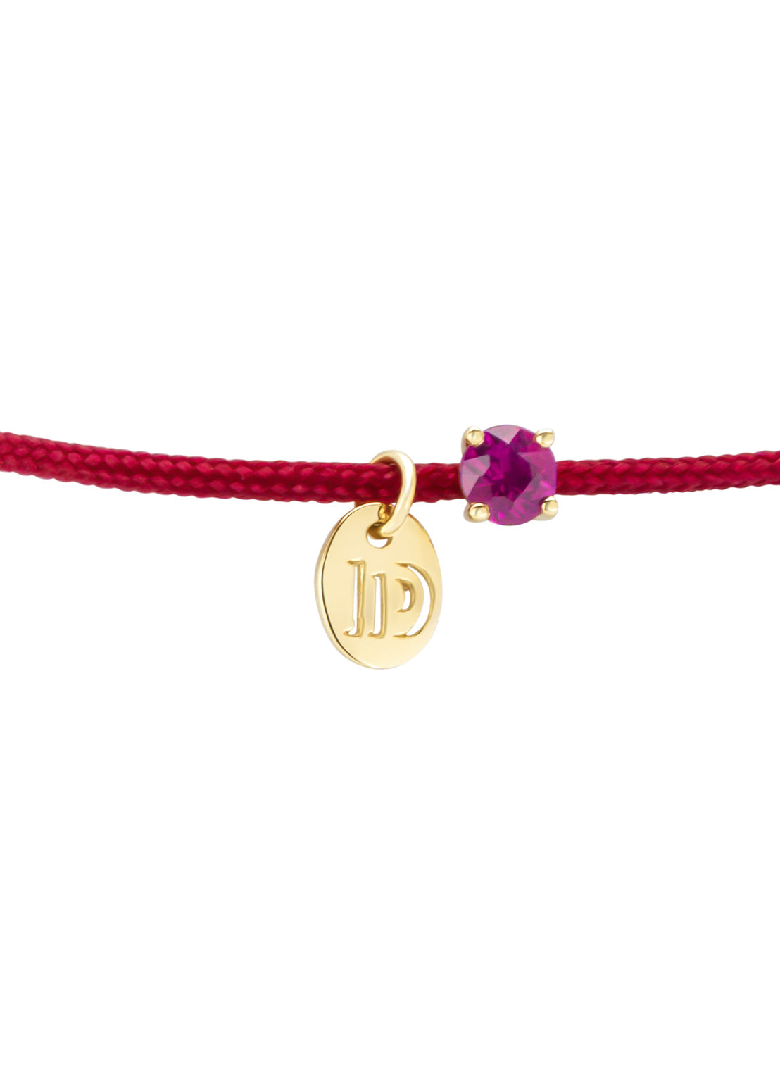 Red cord bracelet with ruby and yellow gold disc charm