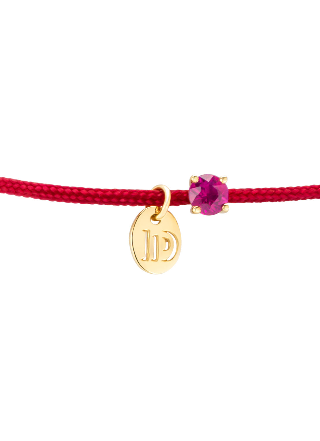 Red cord bracelet with ruby and yellow gold disc charm