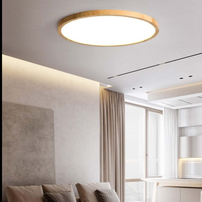 Round dimmable LED ceiling light with a light wood-effect surround