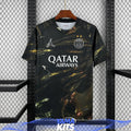 Black Paris football jersey with abstract gold print and short sleeves