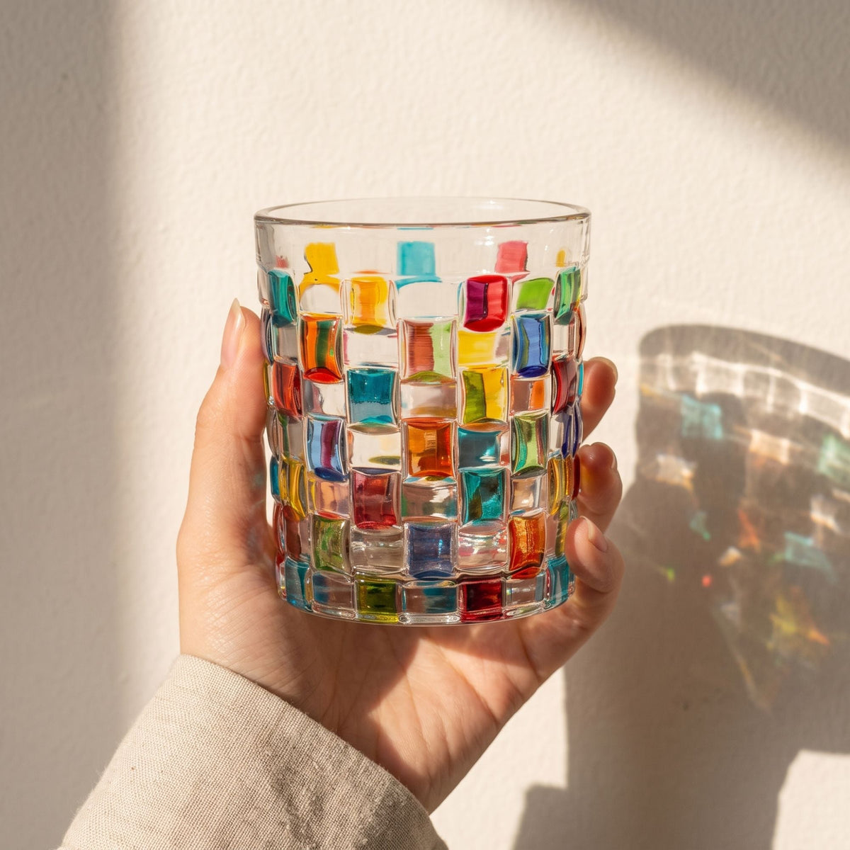 Clear glass tumbler with colourful hand-painted mosaic square design