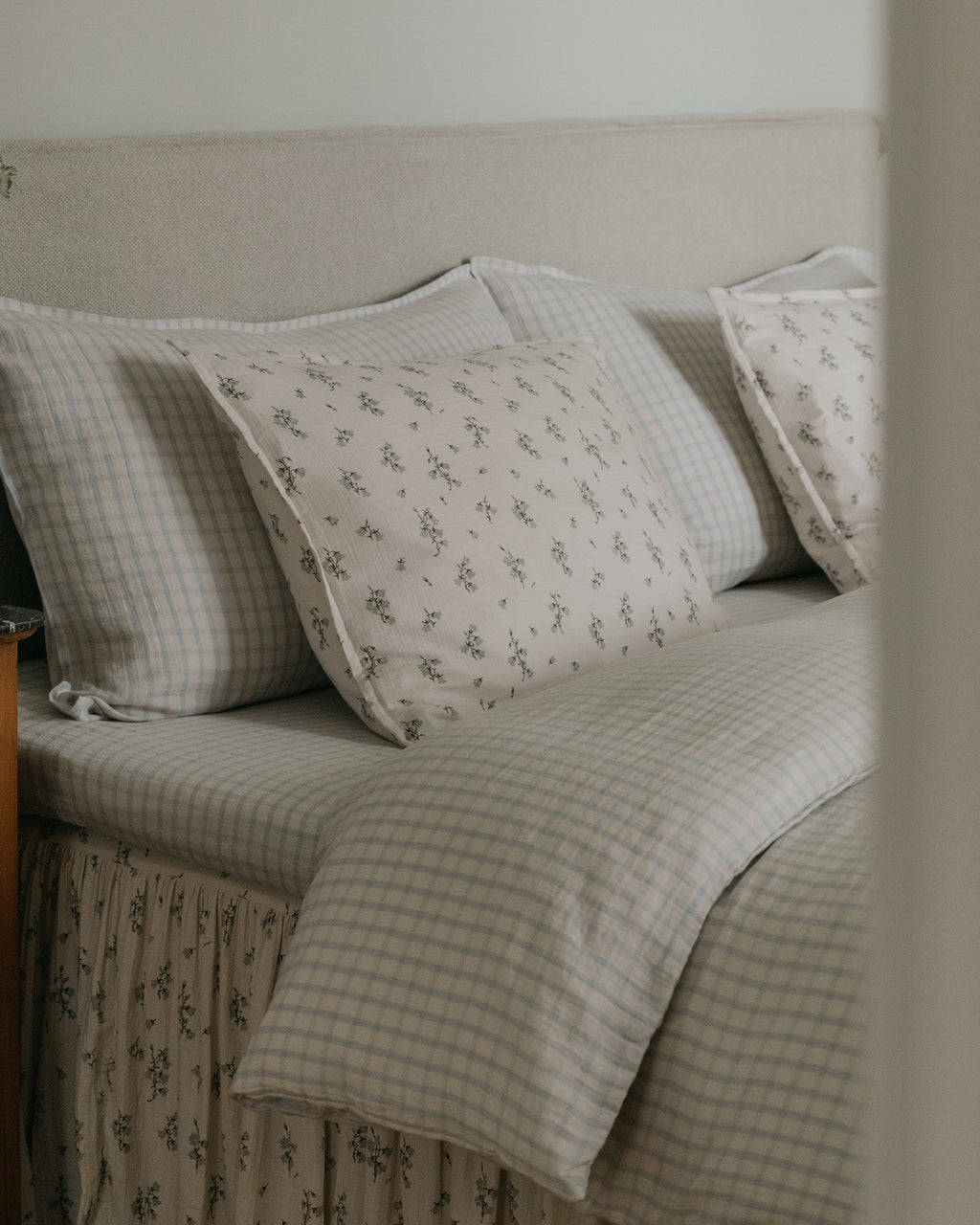 Cream muslin pillowcase with a delicate botanical floral pattern