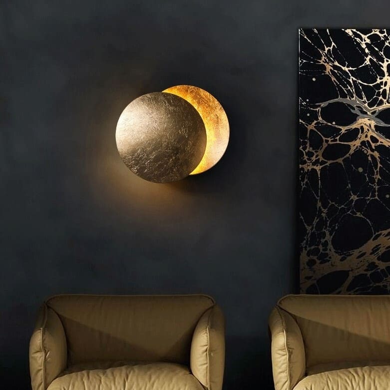 Layered circular LED wall light with an eclipse-inspired design