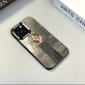 Silver electroplated iPhone 16 case with crest and text graphic