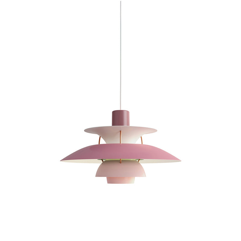 Layered pendant light with overlapping circular shades and hanging cord
