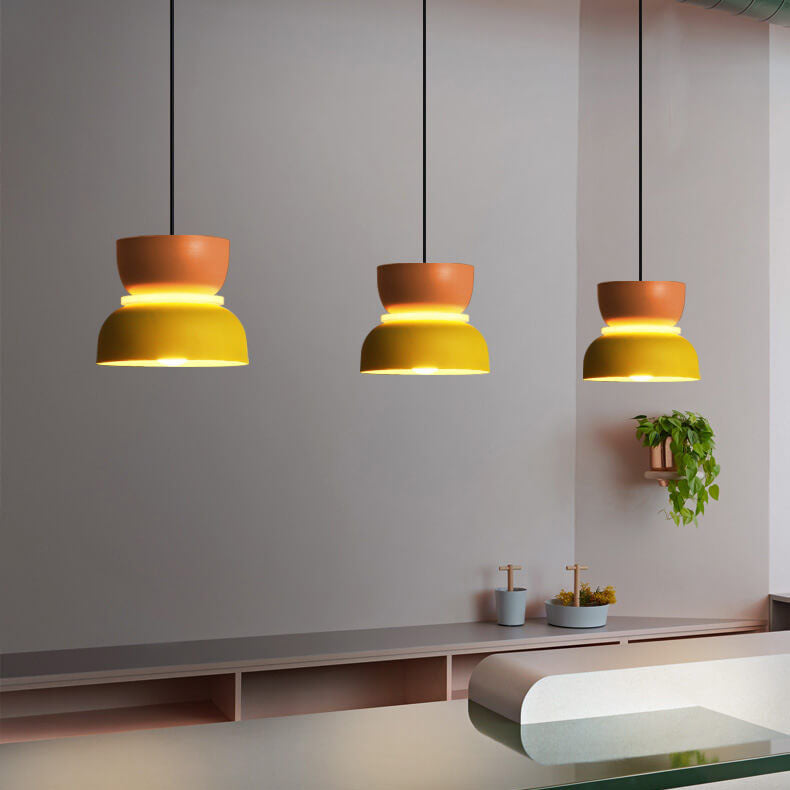 Colourful LED pendant light with a layered rounded shade and hanging cord