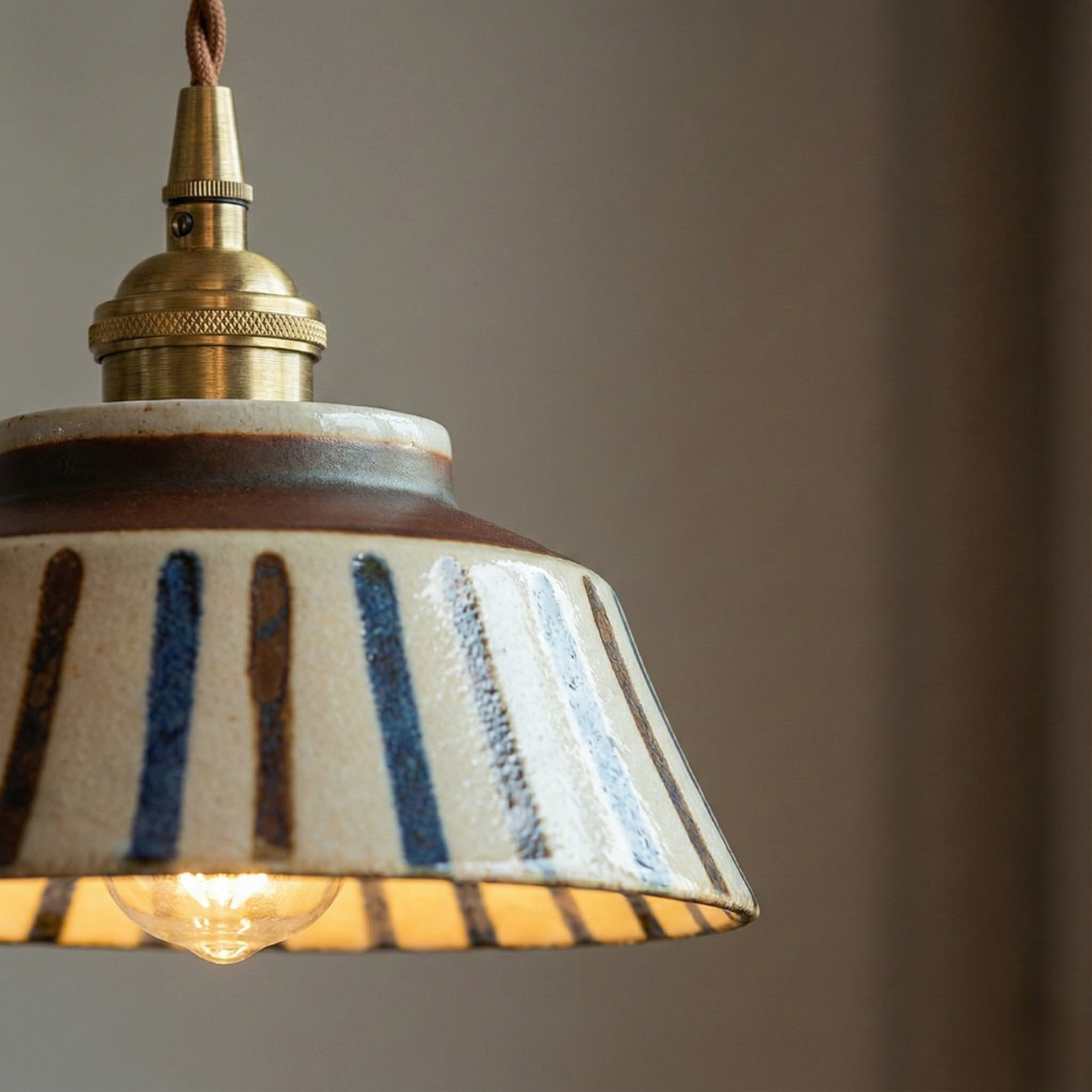 Patterned pendant lamp with tapered shade and twisted hanging cord