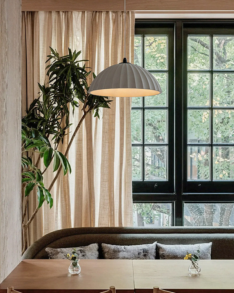 Pleated dome pendant light with hanging cable and ceiling canopy
