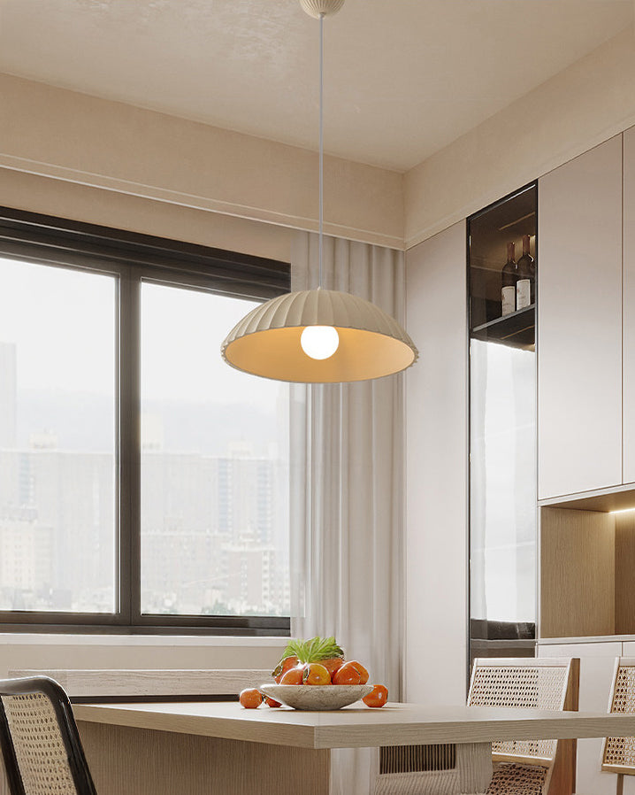 Pleated dome pendant light with hanging cable and ceiling canopy
