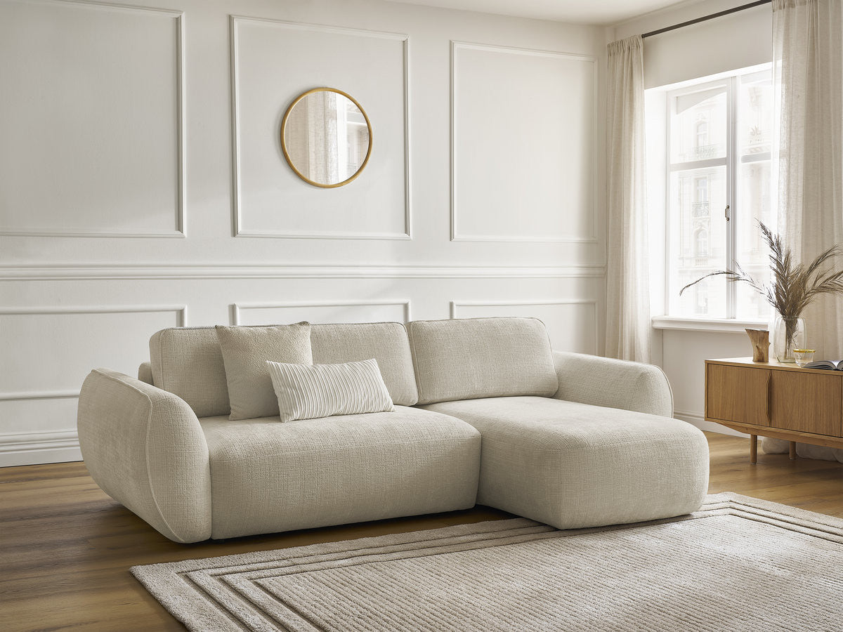 Textured corner sofa bed with chaise and rounded arms