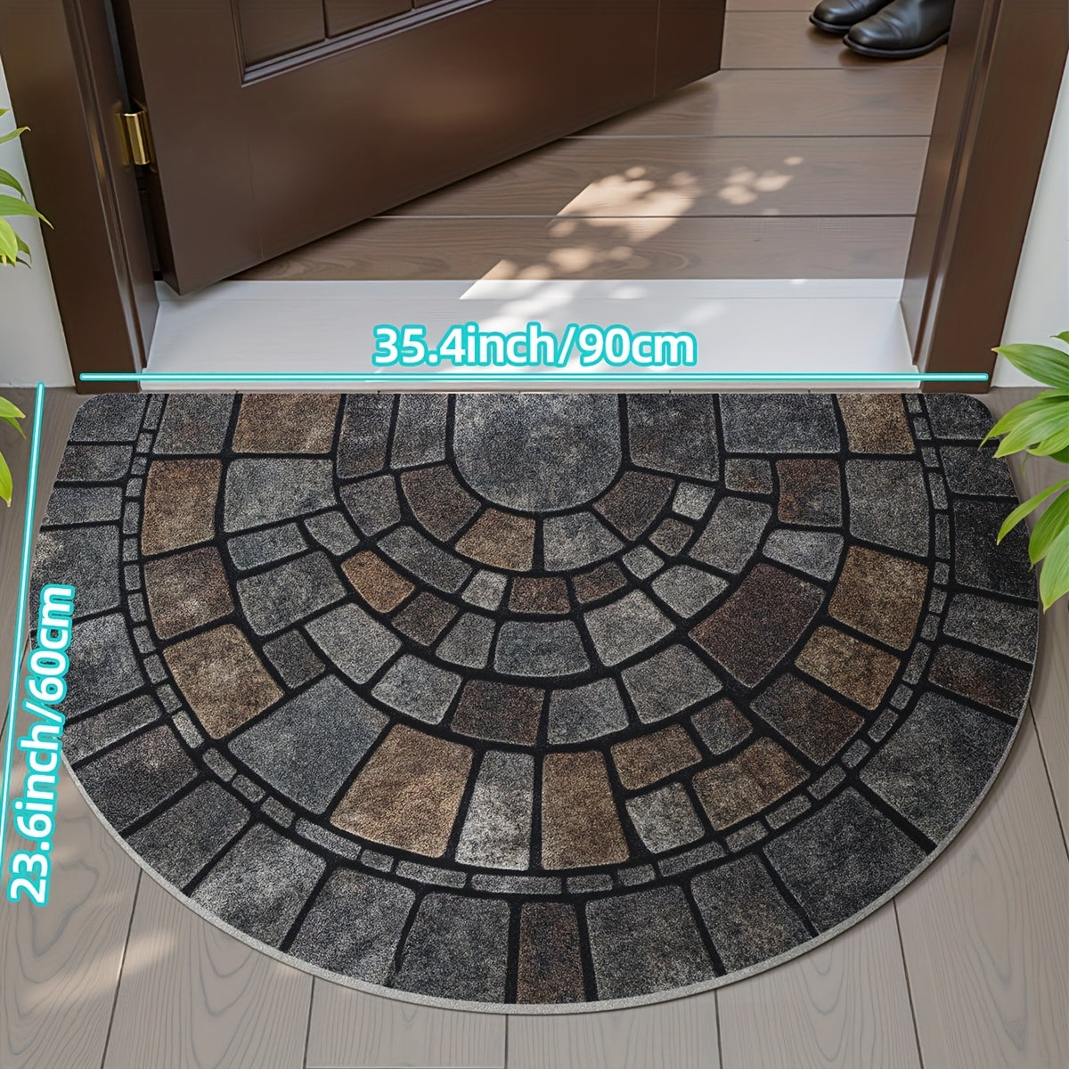 Grey half-circle door mat with geometric mosaic pattern
