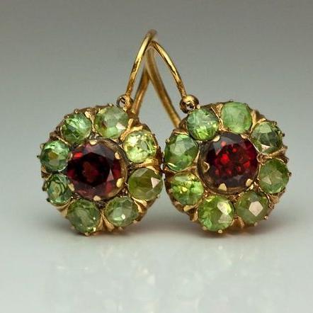 Gold-tone drop earrings with green and red faceted stones