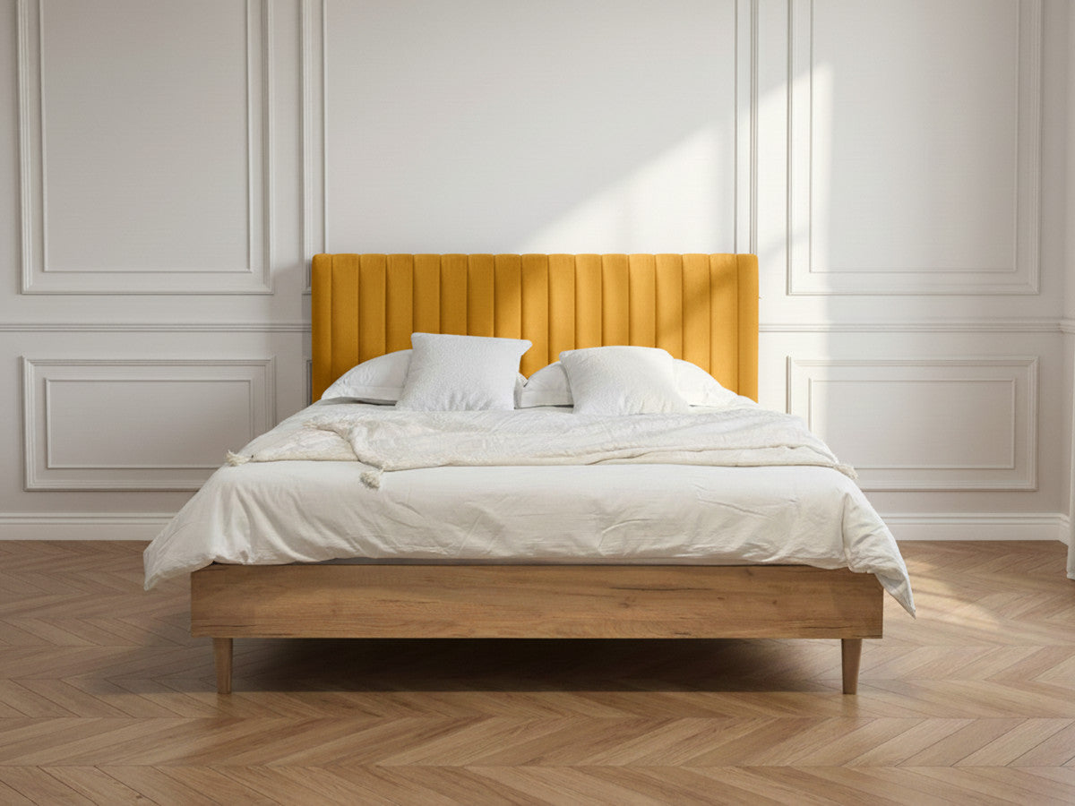 Upholstered bed frame with channelled headboard and wood-effect base