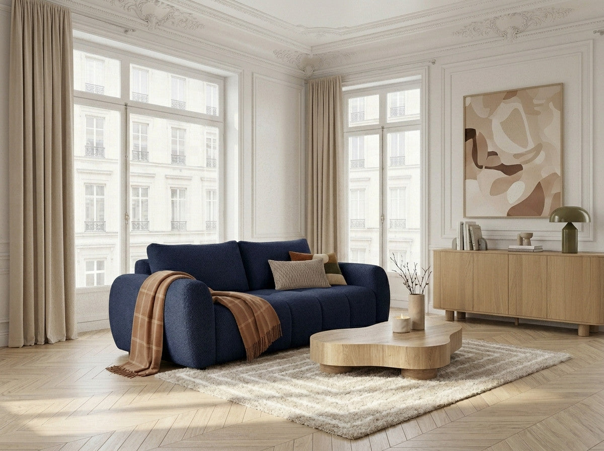Three seater sofa bed with rounded arms and textured boucle upholstery