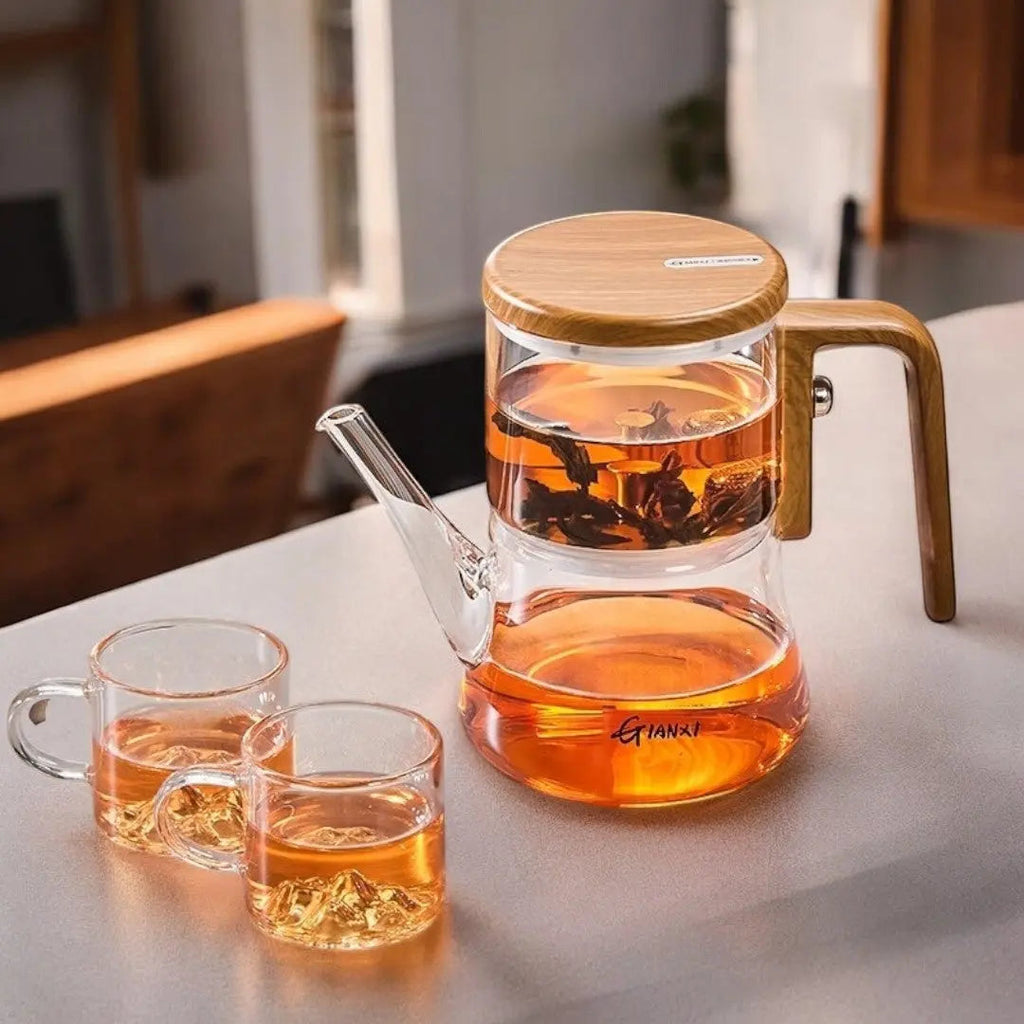 Clear glass teapot with magnetic tea chamber and wood-effect handle