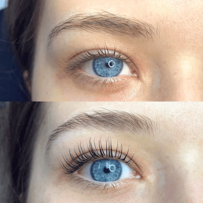 Two white handheld lash lift curlers with textured metal tips