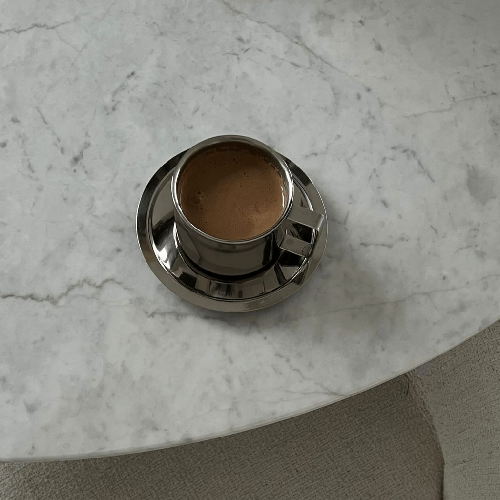 Silver steel latte coffee cup with matching saucer and spoon