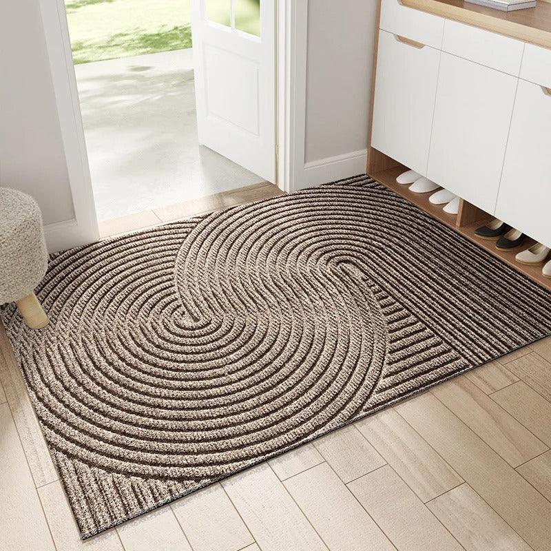 Rectangular geometric ribbed door mat on a hallway floor