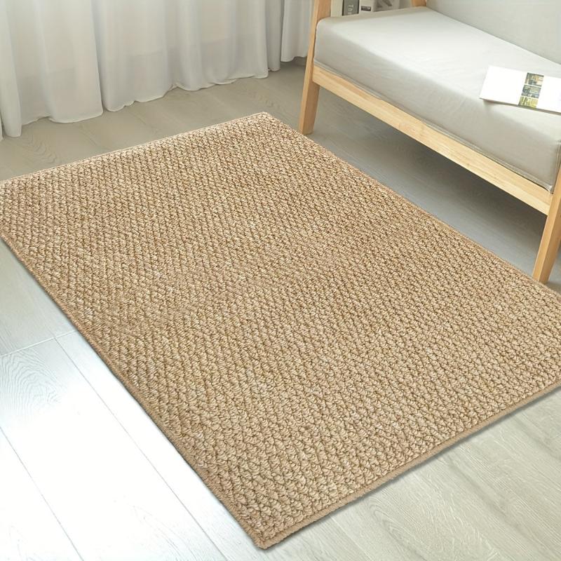 Textured beige rectangular non-slip door mat in an indoor entrance