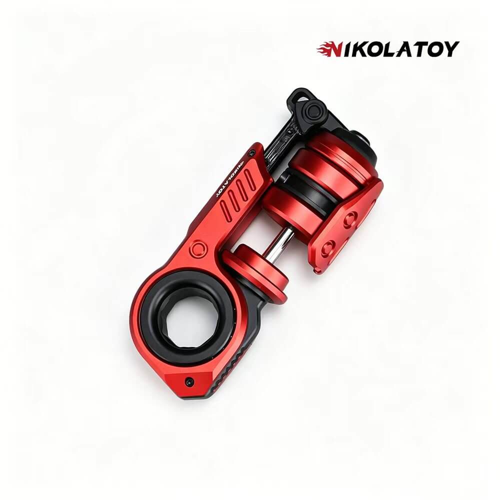 Red and black compact EDC keychain accessory with circular ring and carry loop