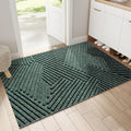 Rectangular geometric ribbed door mat on a hallway floor
