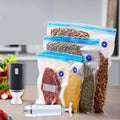 Clear reusable vacuum sealer bags with blue zip seals and hand pump