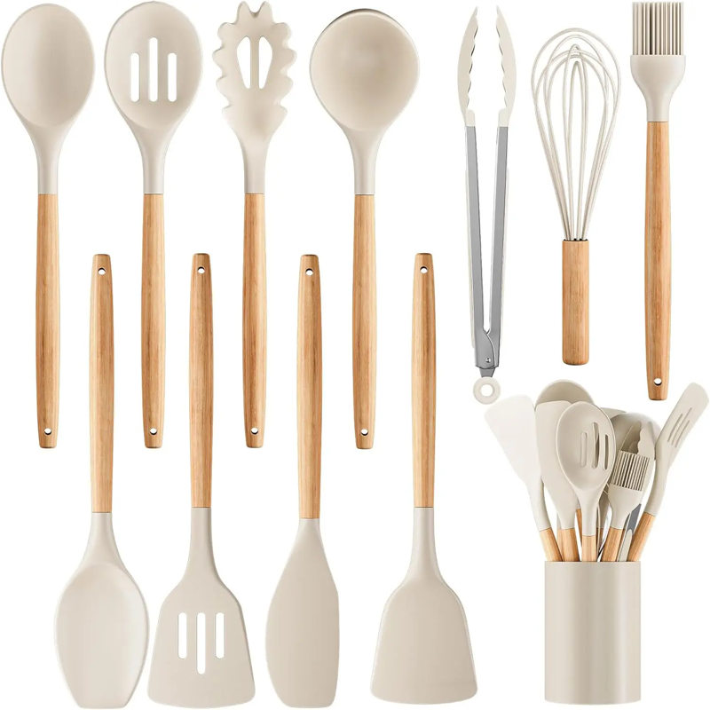 Silicone kitchen utensil set with wood-effect handles in a storage holder