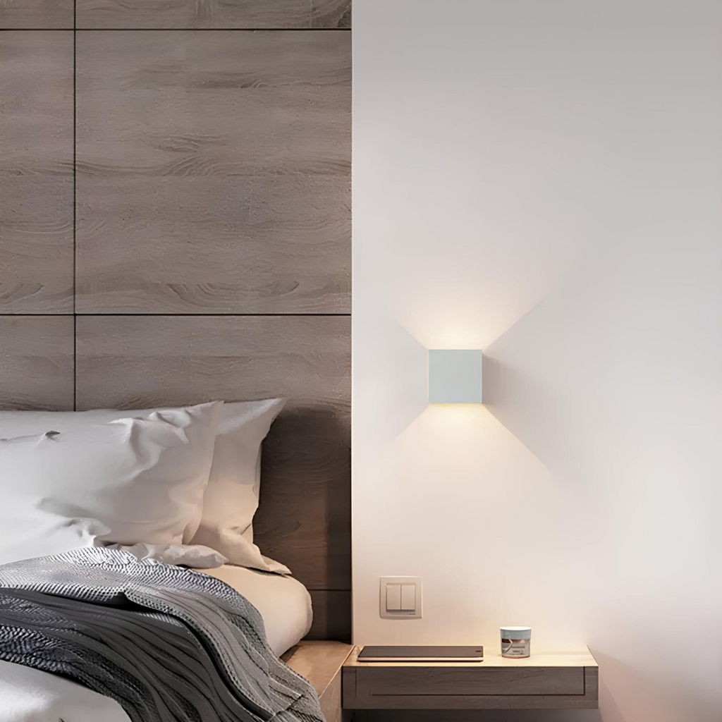 Geometric LED wall light projecting light upwards and downwards