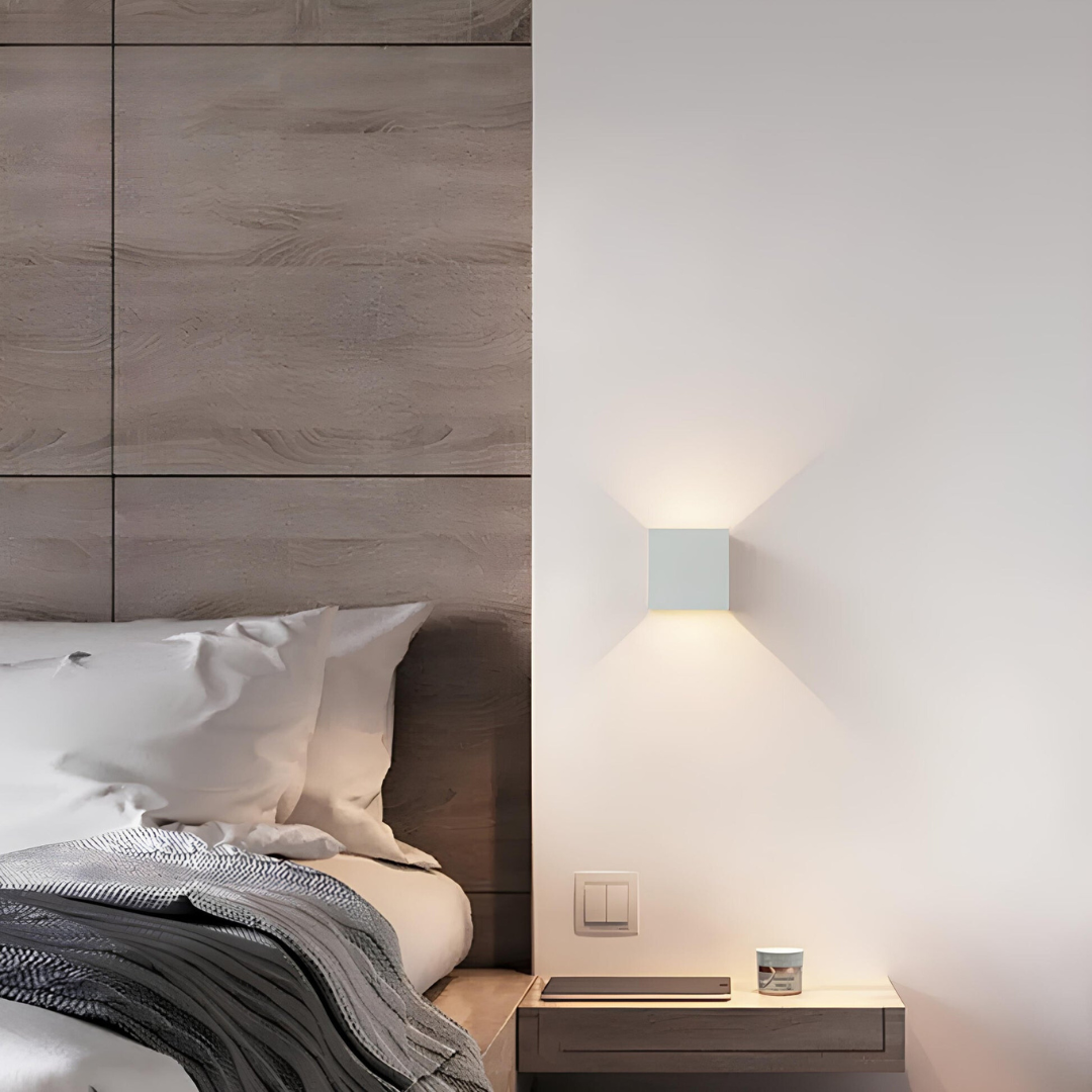 Geometric LED wall light projecting light upwards and downwards