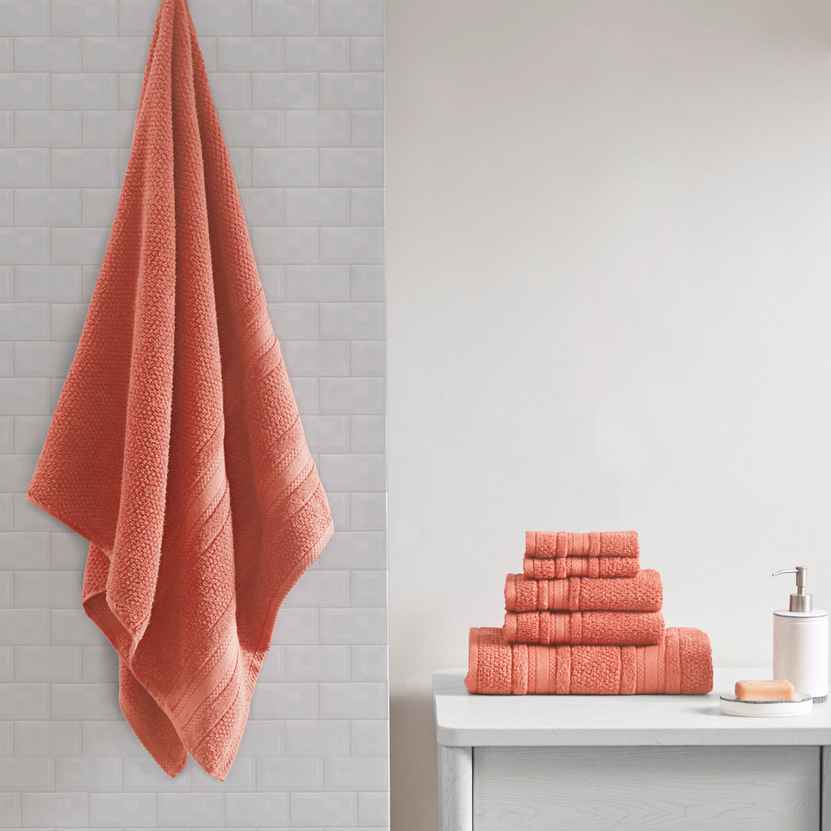 Six-piece textured bath towel set with decorative border detailing