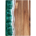 Rectangular wood-grain cutting board with an ocean-inspired resin wave edge