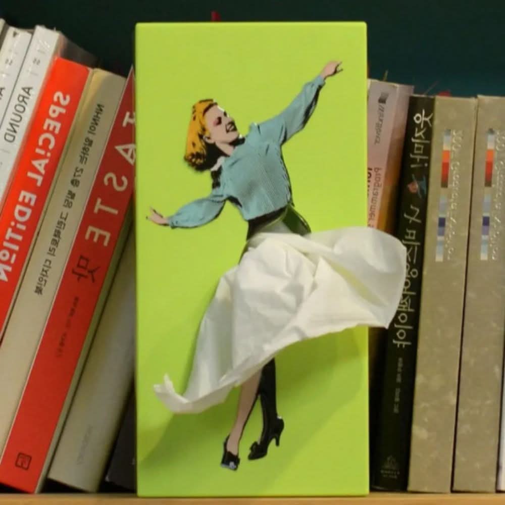 Rectangular tissue box holder with colourful pop art character illustration