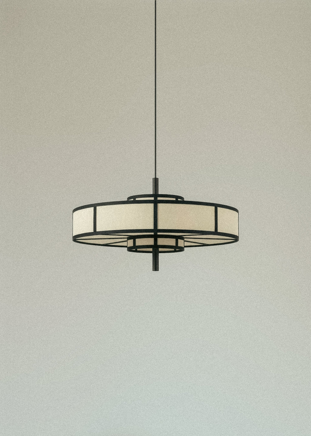 Black frame pendant light with cream drum shade