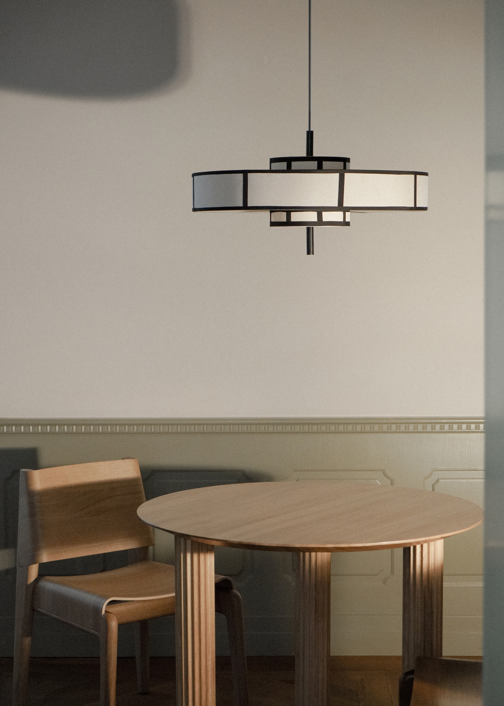 Black frame pendant light with cream drum shade